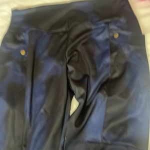 Leggings in blue and black buttons down the side of pants